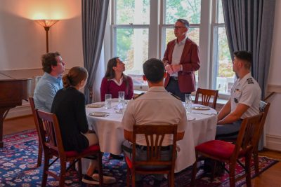 President Sands addresses a room of undergraduate student representatives during a lunch.
